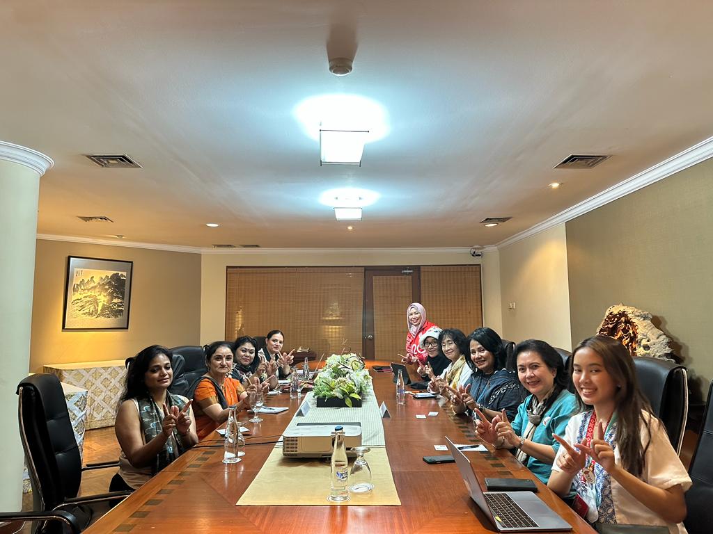 Women sitting at a W20 India meeting